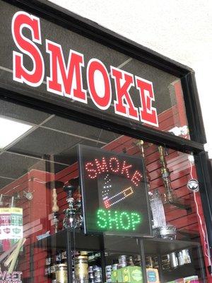 The iconic sign for my favorite smoke shop!!!