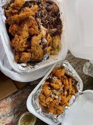 Wing dinner with side of Mac n cheese, red beans and rice, also loaded seafood fried