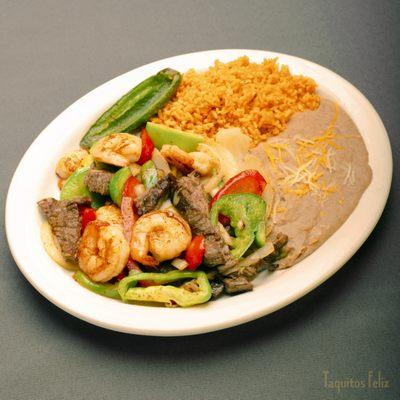 Fajitas - Asada & Shrimp with side of rice and beans and your choice of flour or corn tortillas.