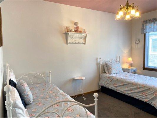 Hall Bedroom dressed in rachel Ashwell Sleeps 3 w/Trundle Day Bed that converts to a Double Bed