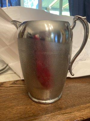 Fixed, repaired pewter pitcher.  The same one, I promise