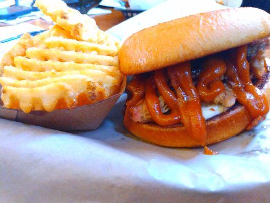 Peanut Butter Pulled Pork, bacon, grilled onions (held), topped with peanut butter BBQ sauce and garlic aioli on the bottom.