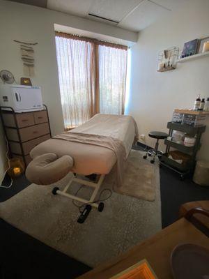 Set up for an in studio massage! Electric lift table makes it accessible during pregnancy and for others with mobility concerns!