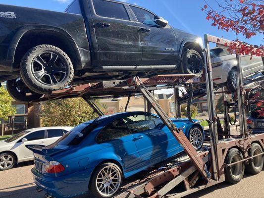 My BMW being loaded onto car hauler