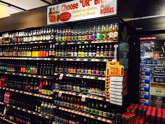 Beer bombers & singles to the left of the walk-in beer cooler. Vast array of selections here.