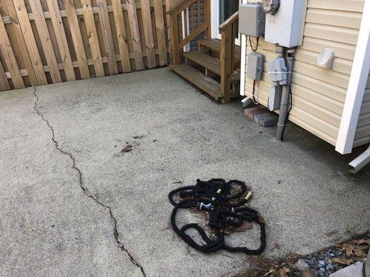 Our ugly patio.. Marcelo worked very hard to remove all this concrete