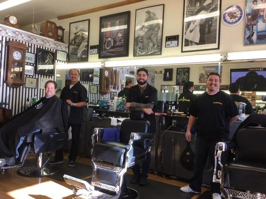 Great barber shop.    Great guys.  Excellent service.  They are open till 6 PM Tues -Friday.    Also do shaves.