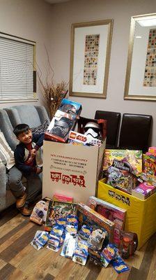 A toys for tots partner. Thank you for participating, this will definitely put lots of smiles on many kids this holiday.