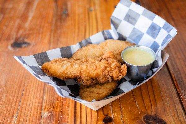 Fresh hand breaded deep fried chicken tenders, served w/ choice of sauce