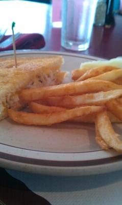 Dungeness Crab & Cheese sandwich with fries.