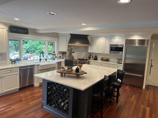 Stratus Calacatta Pantheon quartz countertops with full height backsplash.