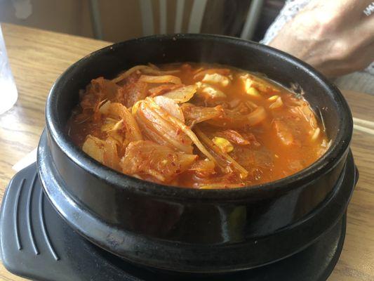 Kimchi spice soup with pork and tofu. So yummy.