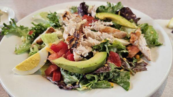 Cobb Salad with grilled chicken with their Killer dressing. (Tangy honey mustard)