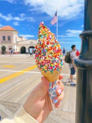 vanilla cone with rainbow sprinkles