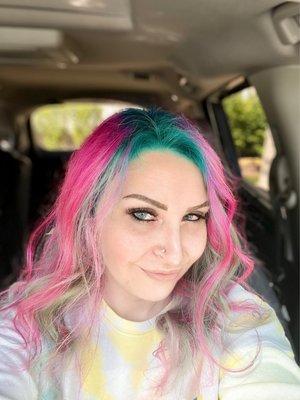 Female with unicorn hair with lash extensions and eyebrow powder micro combo