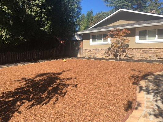 What was once grass and dirt, now is fresh new mulch.