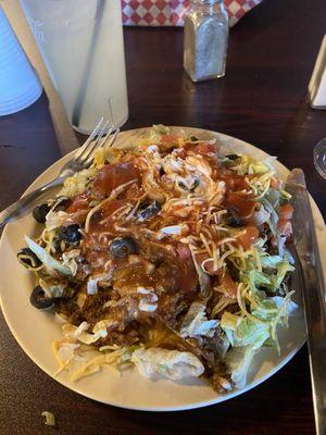 Indian Taco Special. Everything is fresh and the taco meat is delicately seasoned. Everything goes well together.