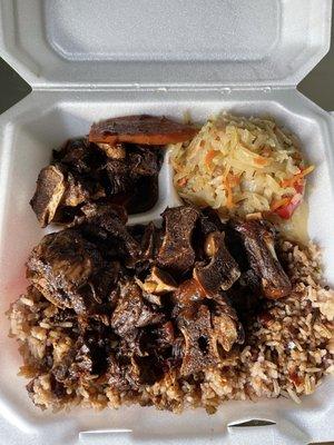 Oxtail with rice beans and cabbage