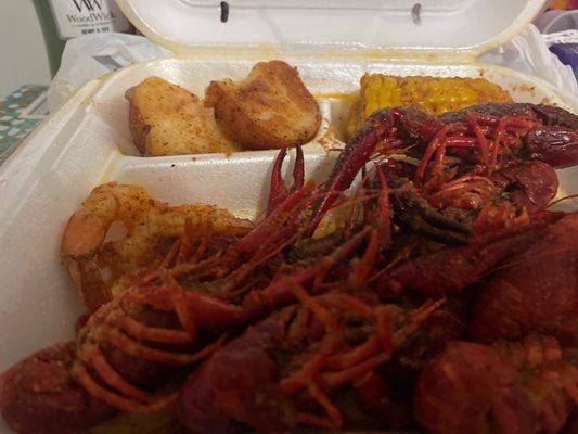 Crawfish and shrimp and potato and corn