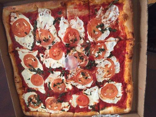 Grandma pizza (16"), close to a Sicilian style pizza, cut into 12 slices. Soft, consistent, and tasty. Great for sharing! (3/4/2017)