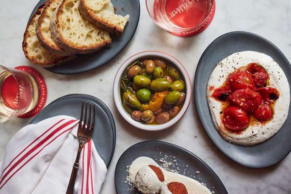 A collection of antipasto dishes plated