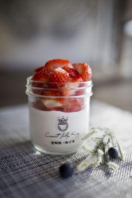 coconut jelly topped with fresh strawberries.