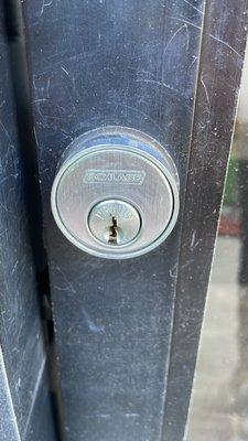 Installing a commercial lock.