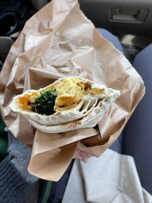 Unexpected broccoli in a veggie breakfast burrito... My heart sings!