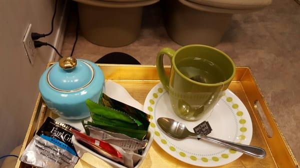 While you're under the blow dryer or waiting, they give you your choice of teas.