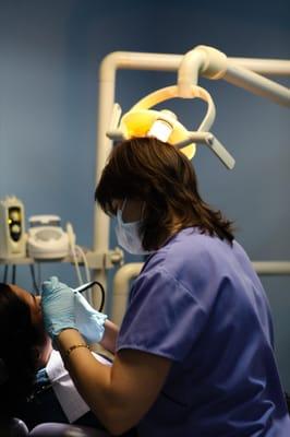 Hygienist with patient at dental office