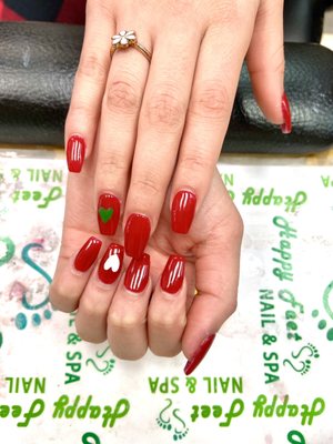 Full set nails, acrylics, red with white and green hearts