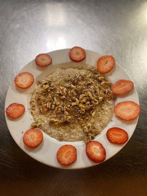 Oatmeal with strawberries, walnuts, and brown sugar!