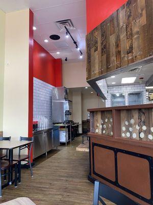 Beverage station and hallway to the bathrooms