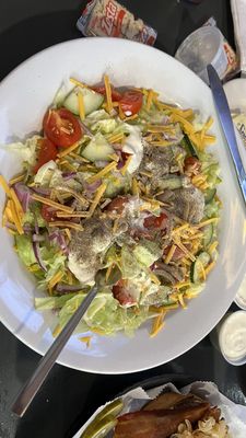 The large garden salad is a very large salad, and is a good value. The blue cheese dressing is excellent.