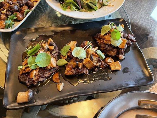 Ribeye steaks with wild mushrooms