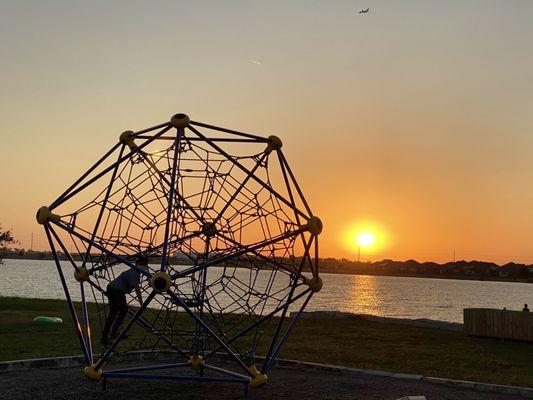 Sunset and climbing play wheel.