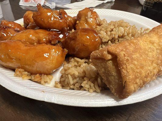 General Tso chicken with an egg roll.