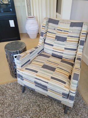 Transitional chair goes modern or more traditional depending on fabric chosen.  31wx35dx38h scale work  in many spaces.