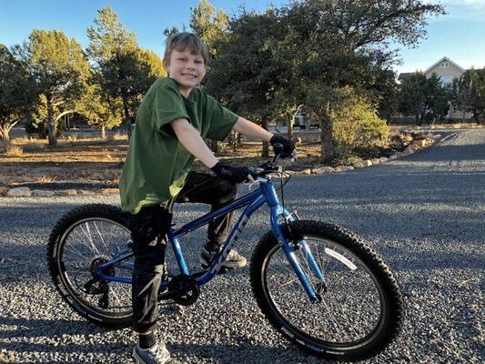 Side angle of my boy and his new bike!