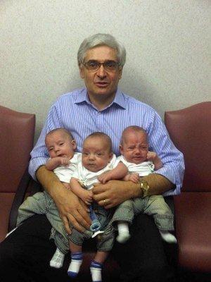 Dr. Shifrin with delivered by him triplets.