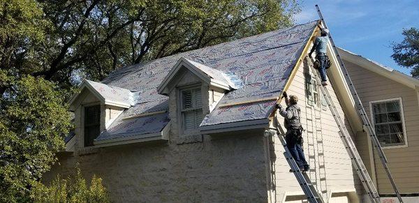 Replacing rotten wood preparing for paint, and a new standing seam metal roof!