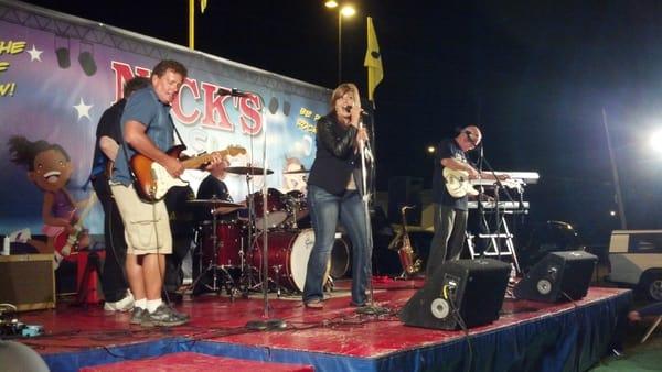 Brittany singing with the Scott Free Band