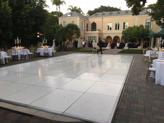 White Dance floor over swimming pool for a wedding In Beverly Hills CA