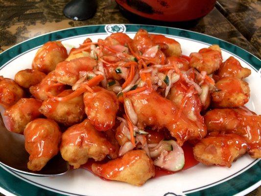 Sweet & Sour Chicken, with a pickled cucumber salad atop, delicious.