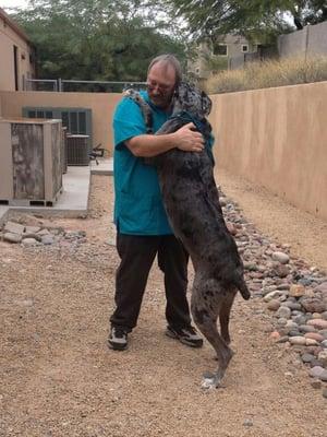 My girl friend, Daisy, giving me a hug. Photo by co-worker, Wendy.