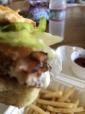 Bacon Cheeseburger with fries and ketchup!