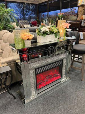 Fireplace with adjustable heater and Bluetooth speakers