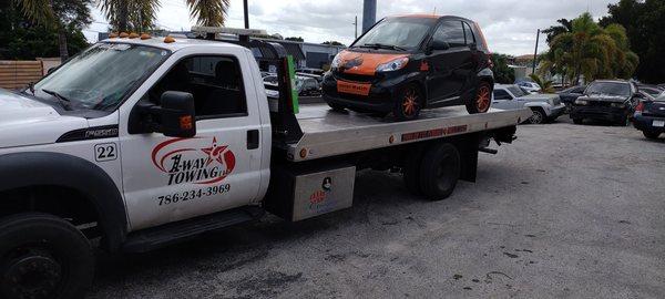 We tow mini cars smart cars