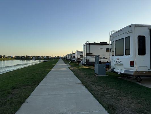 Wide sidewalk around and near lake