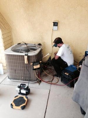 One of our service technicians welding a copper refrigerant line.